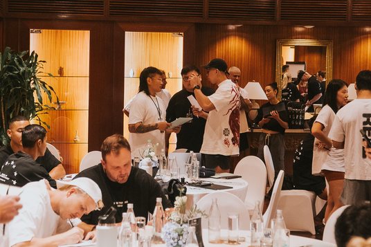 Owners and managers working together in a conference session