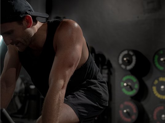 A member mid-session on the training floor